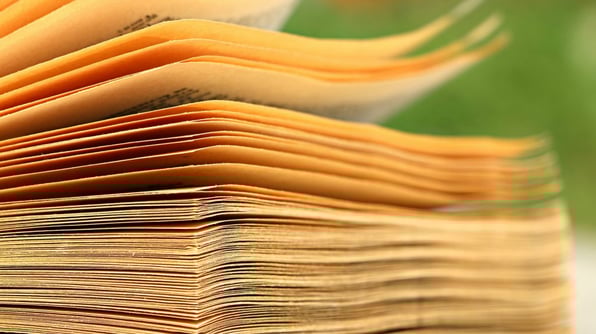 stack-of-newspapers-1024x575