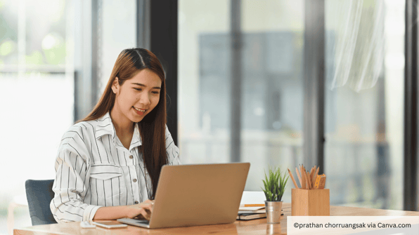 woman at laptop writing content