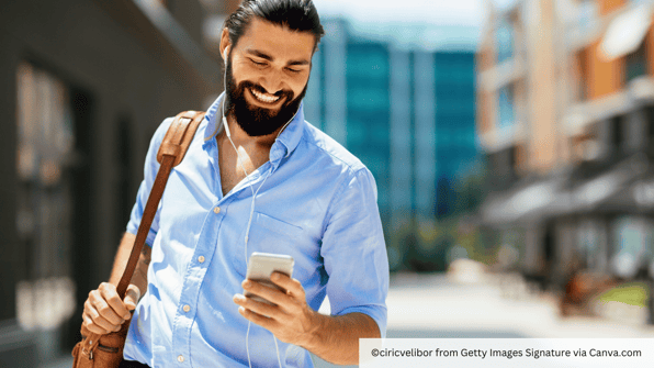 man looking at social media on smartphone