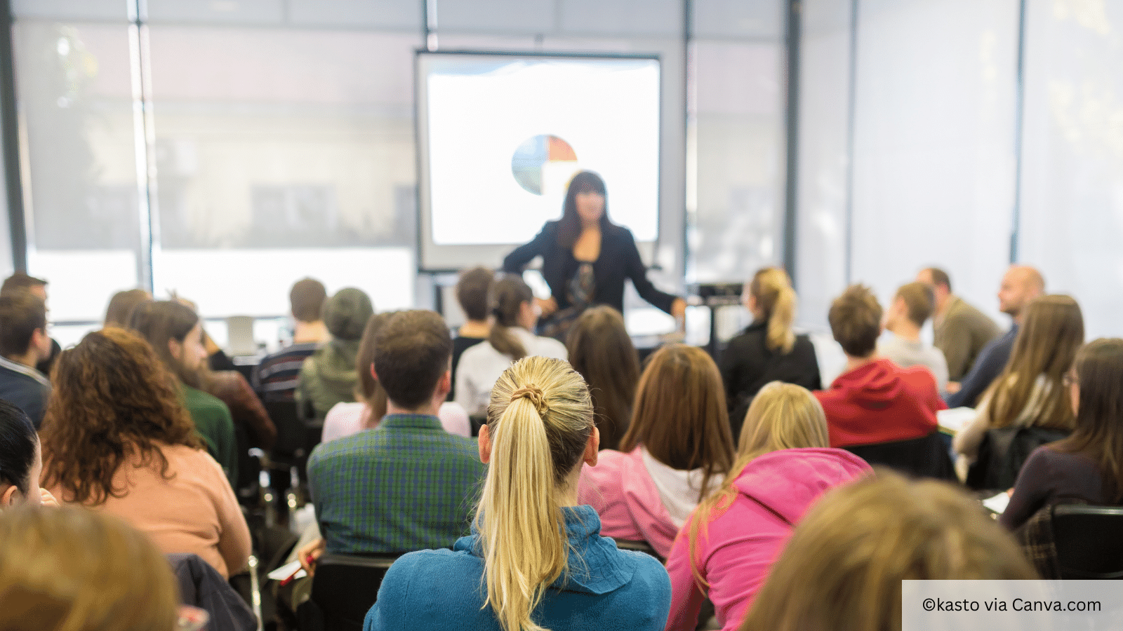 faculty giving a lecture to a crowd