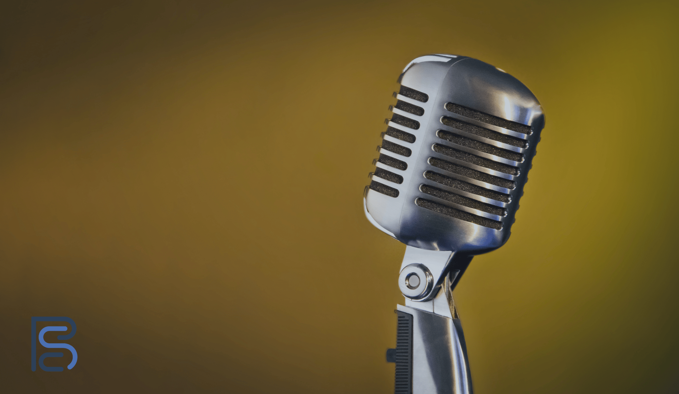 microphone on a mustard colour background