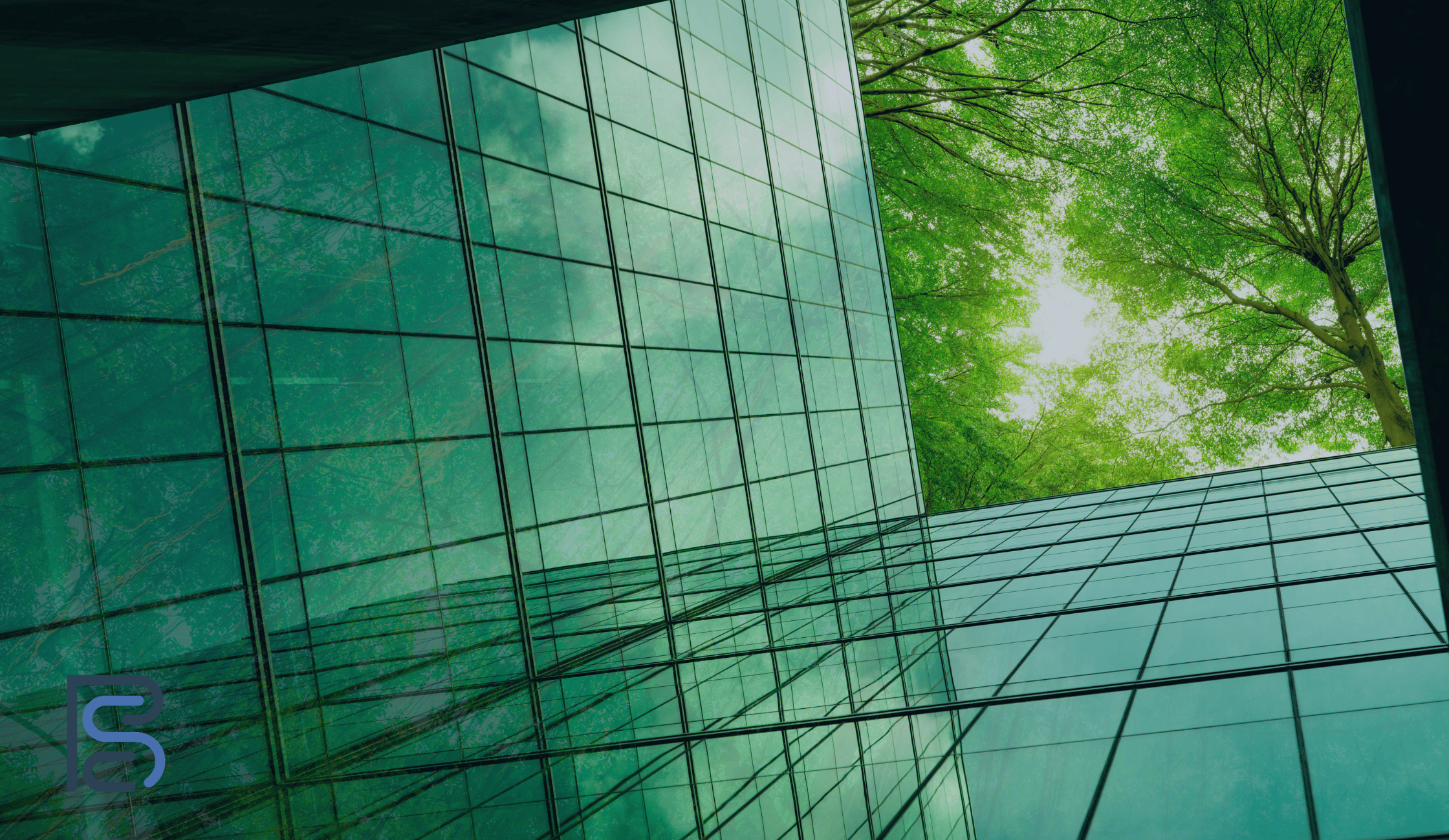 green building with trees