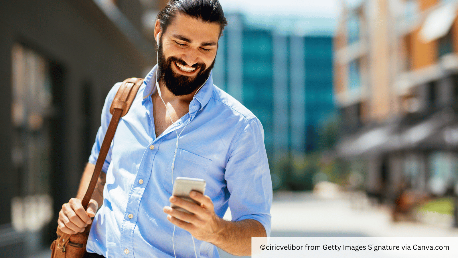 man looking at social media on smartphone